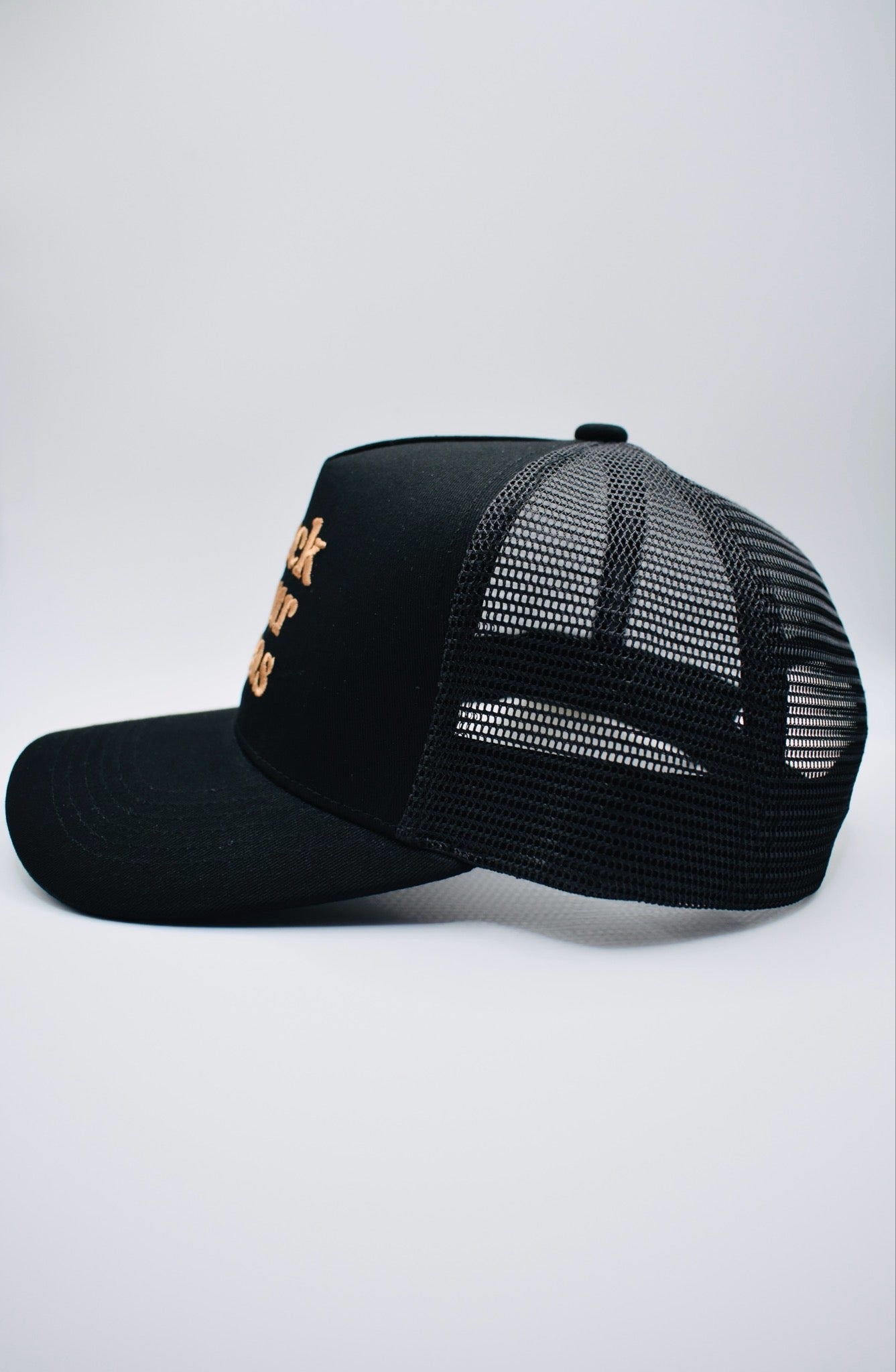 Buck Your Ideas Black / Tan Trucker Cap